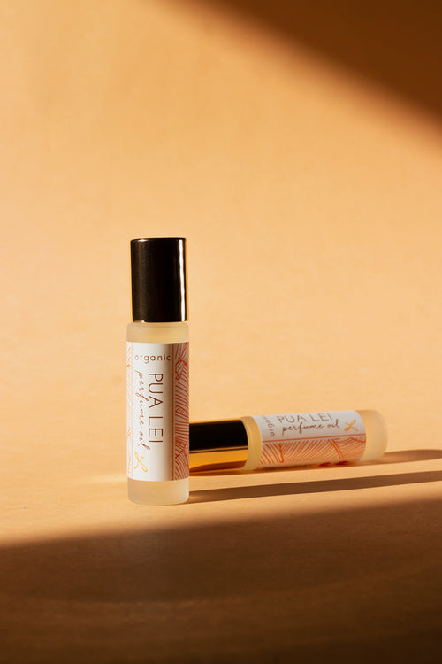 Leahlani Huile Bio Parfumée Pua Lei - Sans Alcool de 10 ml dans un roller stick en verre